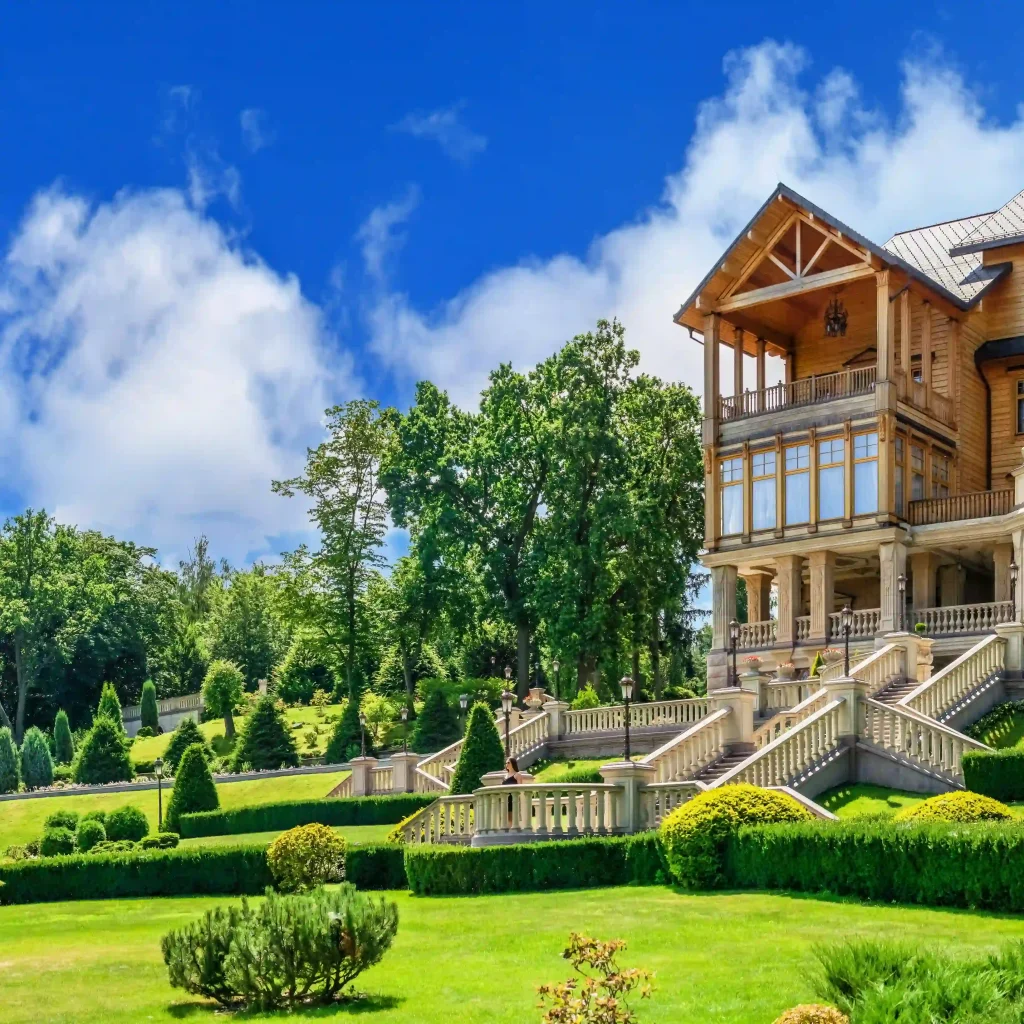 Large luxury wooden home with natural timber exterior on a sunny day